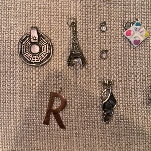 Bundle of charms and rings, various brands